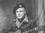 A wartime Fred J Taylor with his guitar