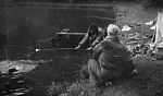 Richard Walker netting a fish